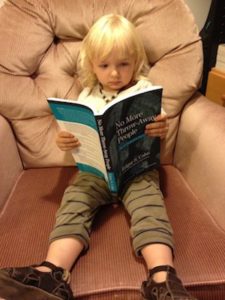 Sydney reading No More Throw-Away People