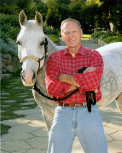 Tab is most at home with his horses and partner of 33 years, Allan Glaser.